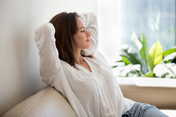 Woman breathing comfortably in her home